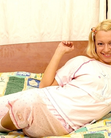 Olya sleeping and dressed in pajamas