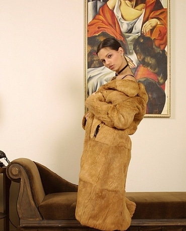 Eva in a full length fur coat