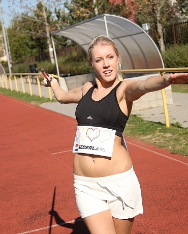 Kathy on the track field playing