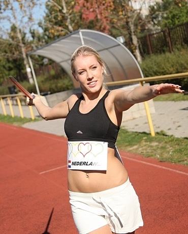 Kathy on the track field playing