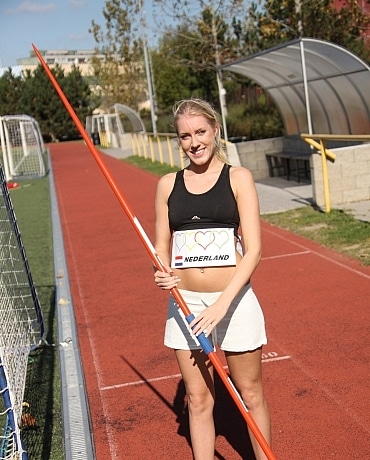 Kathy on the track field playing