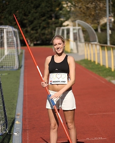 Kathy on the track field playing