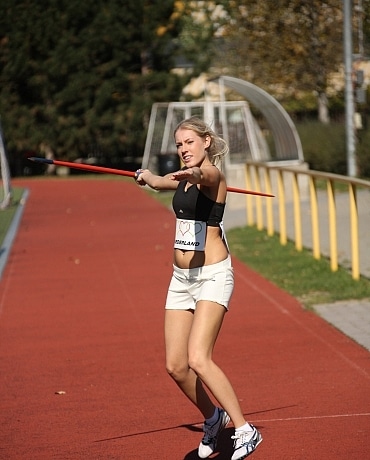 Kathy on the track field playing