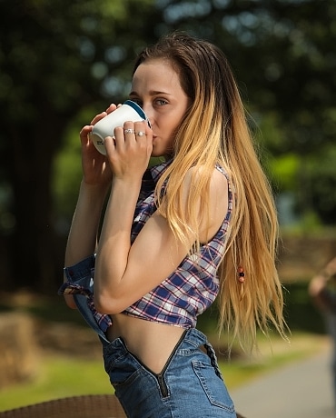 Melody in overalls getting naked playing with a toy